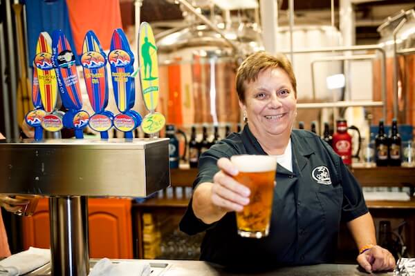 Lori Clough holding a beer